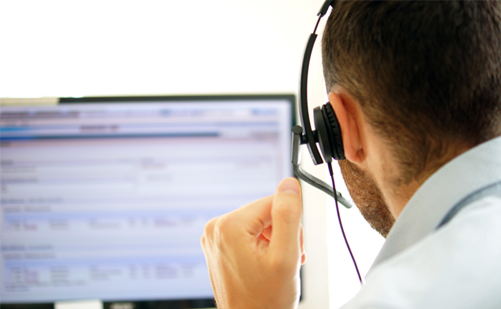 Man on phone offering broker support