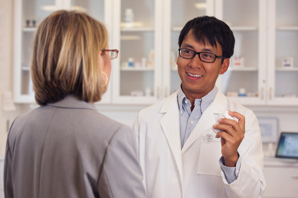 Pharmacist discussing medicine