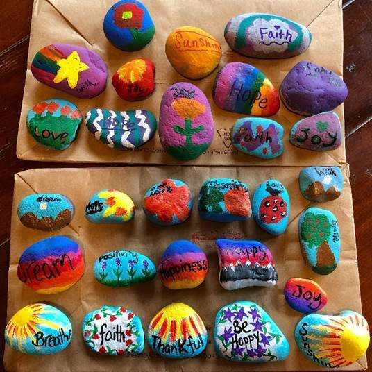 Positive messages painted on rocks