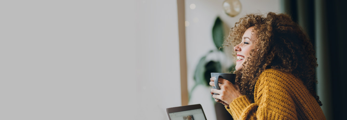 Woman smiles knowing she has voluntary benefits protection for her and her family