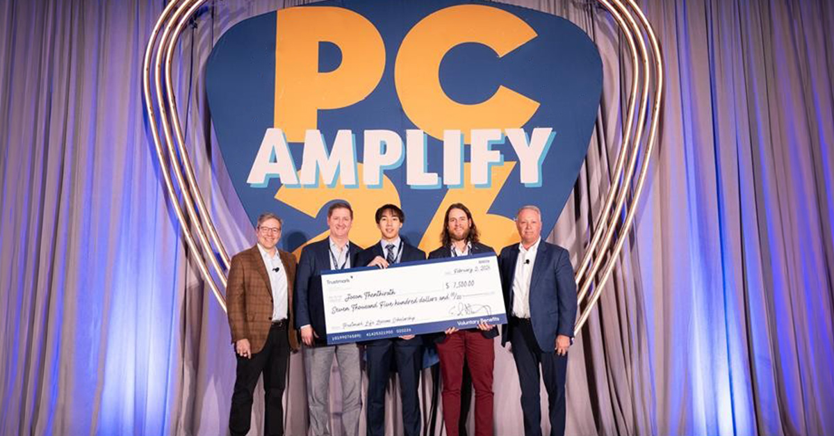 Trustmark Voluntary Benefits senior leadership presents the Trustmark Life Lessons Scholarship to Joson Thenthirath at the 2026 Producer Conference.